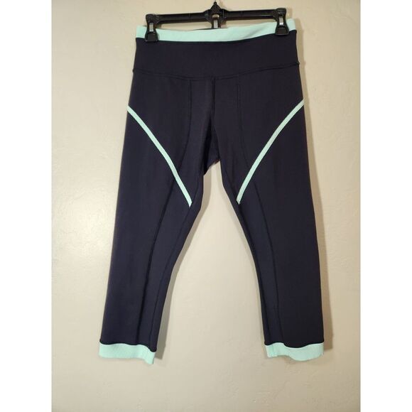 Lululemon Roll Out Crop Leggings Size 6 Black and Mint Green - Picture 1 of 7